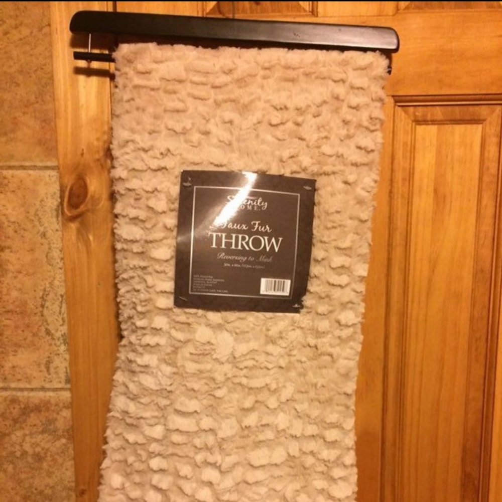 Faux Fur Throw With Wooden Hanger